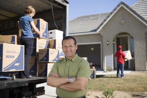 Moving team preparing a home relocation in Harrow on the Hill