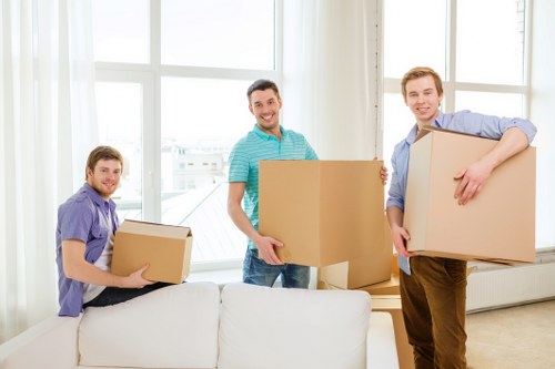 Worker using careful manual handling during a move