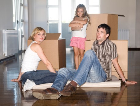 Packed moving boxes and furniture prepared for local house removals